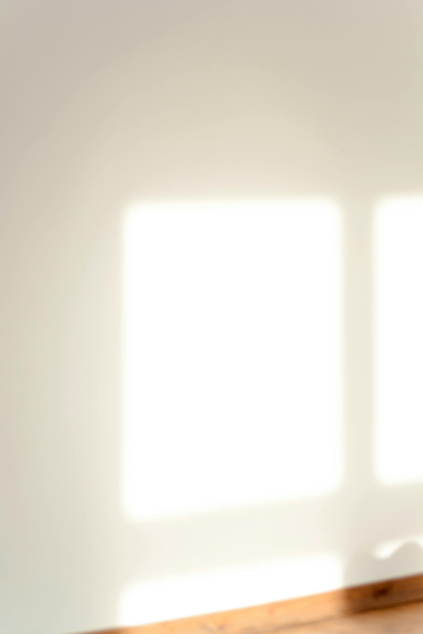 Natural light on an empty wall, pattern of shadows